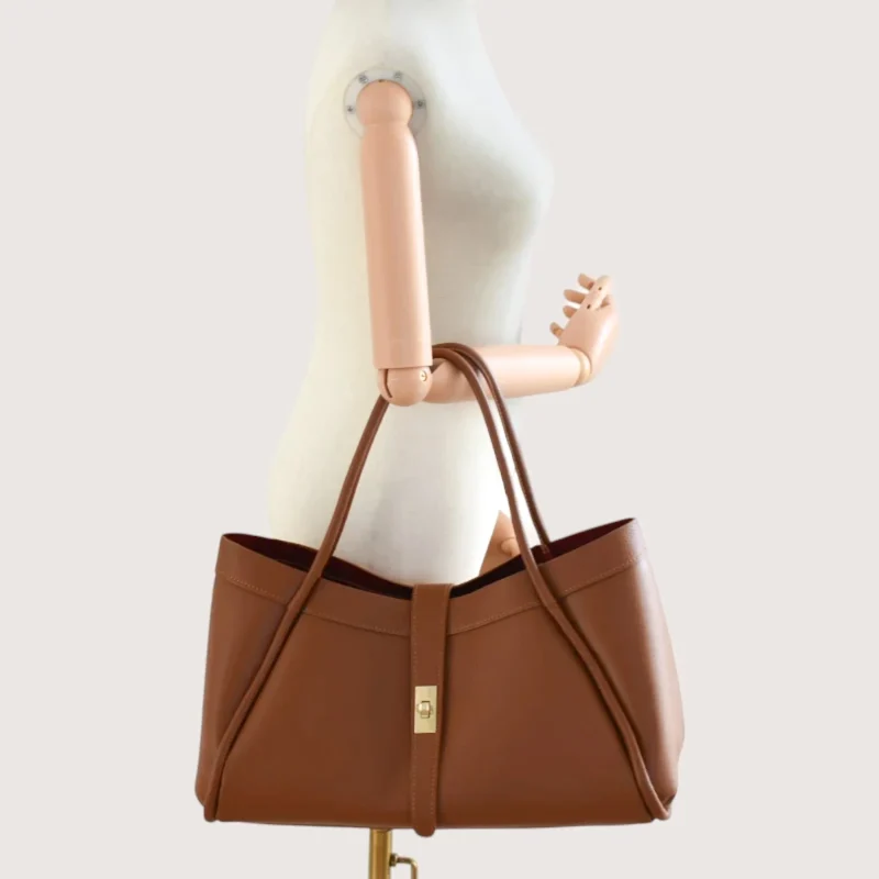 Marge camel Leather Handbag on hand