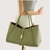 Marge Pistachio Green Leather Handbag on hand