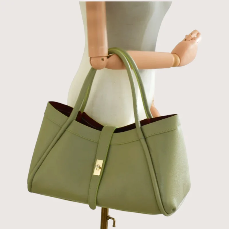 Marge Pistachio Green Leather Handbag on hand