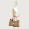Marge Taupe Leather Handbag on hand