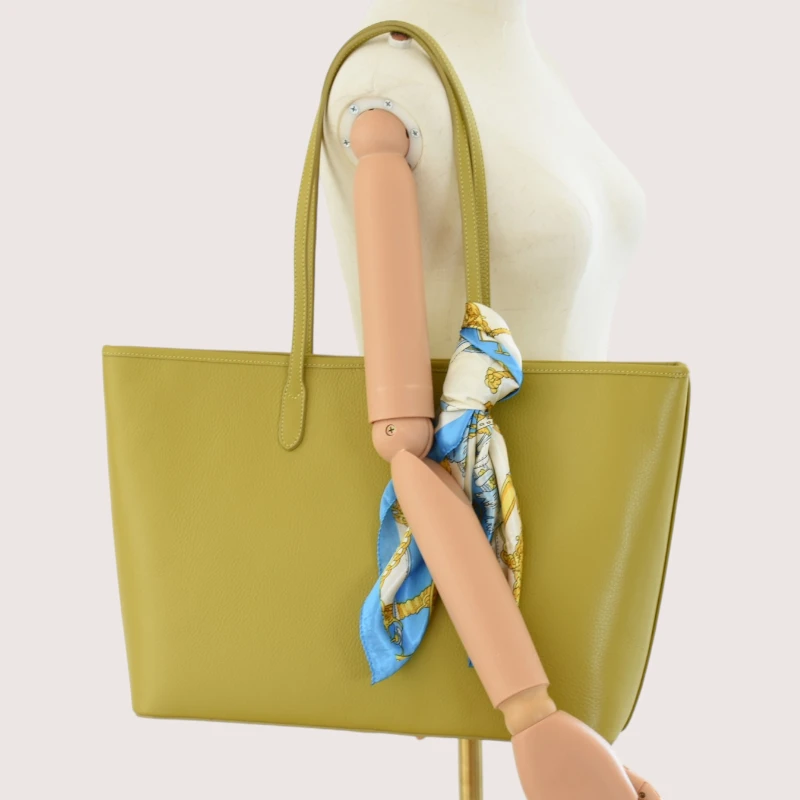 lime green leather tote bag interior on model 2 lime green leather tote bag interior on model 2