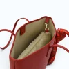 red leather tote bag interior details