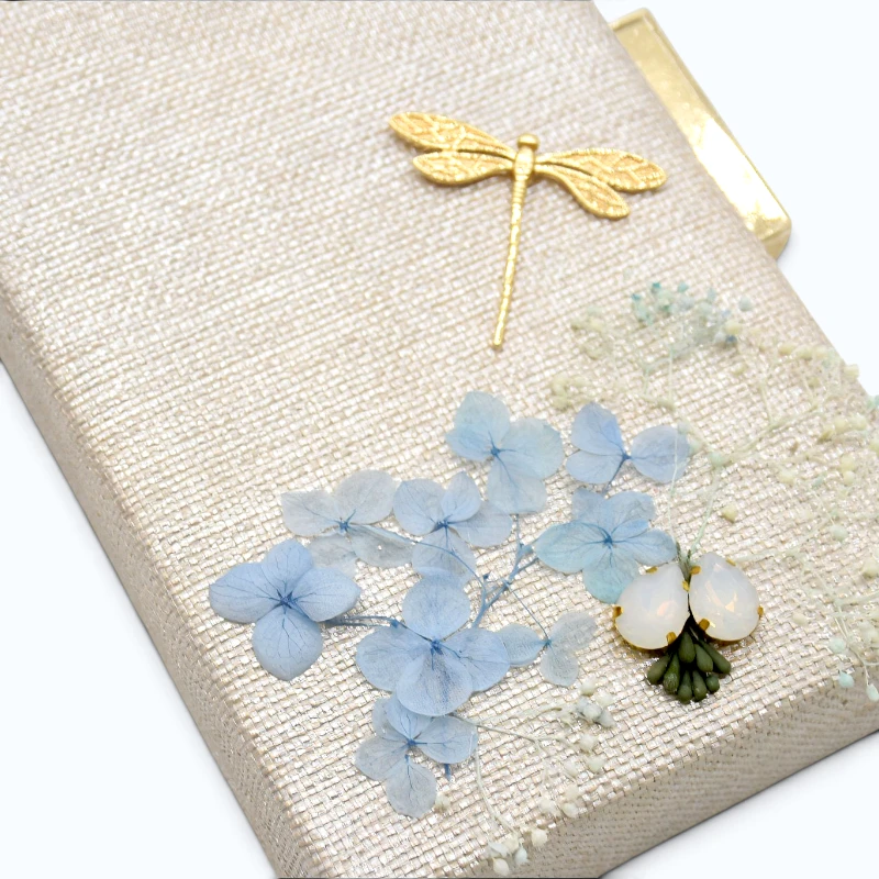clutch fleur d azur detail