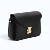 margot-back-leather-crossbody-bag-side-view margot black leather crossbody bag side view