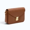 margot camel leather crossbody bag straps side detail