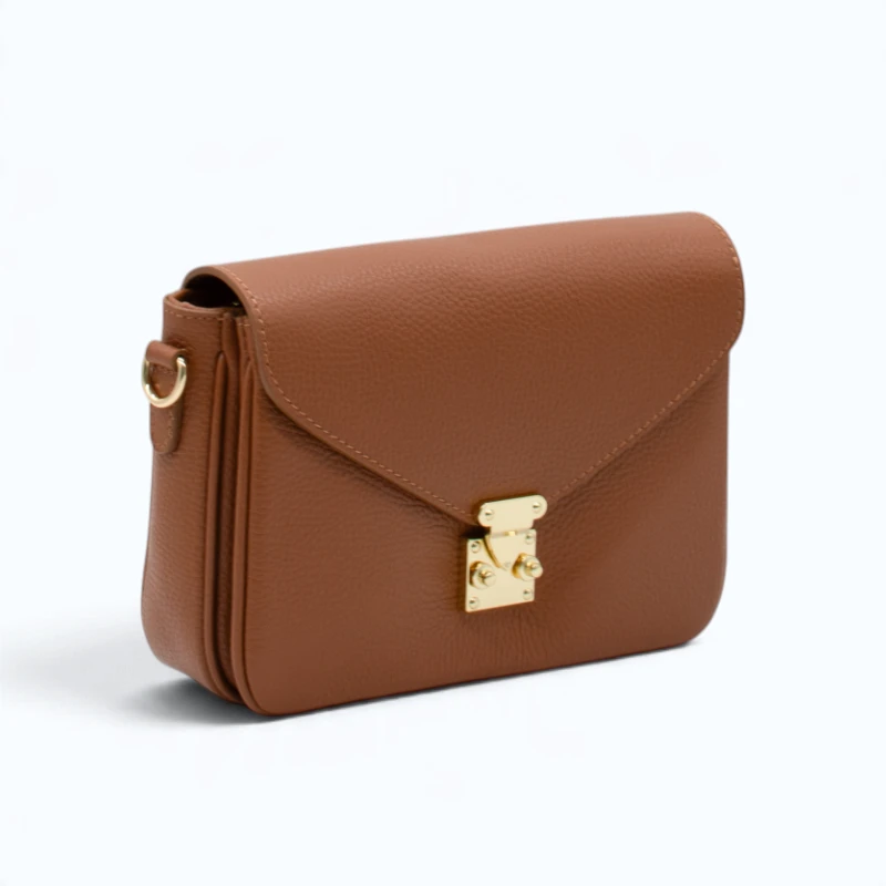 margot camel leather crossbody bag straps side detail