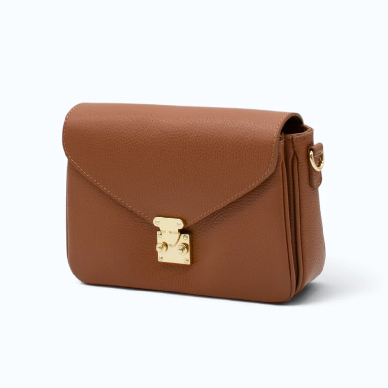 margot camel leather crossbody bag straps side view